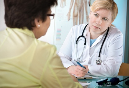 middle-aged lady talking with female doctor